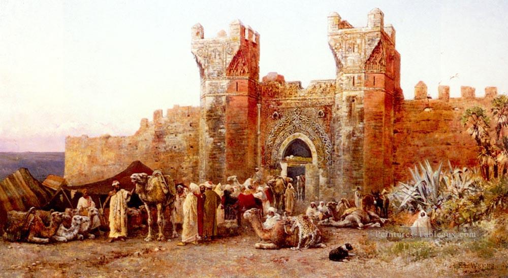Le départ d’une caravane de la porte de Shelah Maroc Persique Egyptien Indien Edwin Lord Weeks Peintures à l'huile